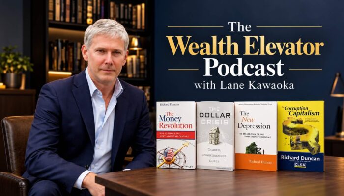 Richard Duncan with his four economics books, promoting The Wealth Elevator Podcast with Lane Kawaoka.